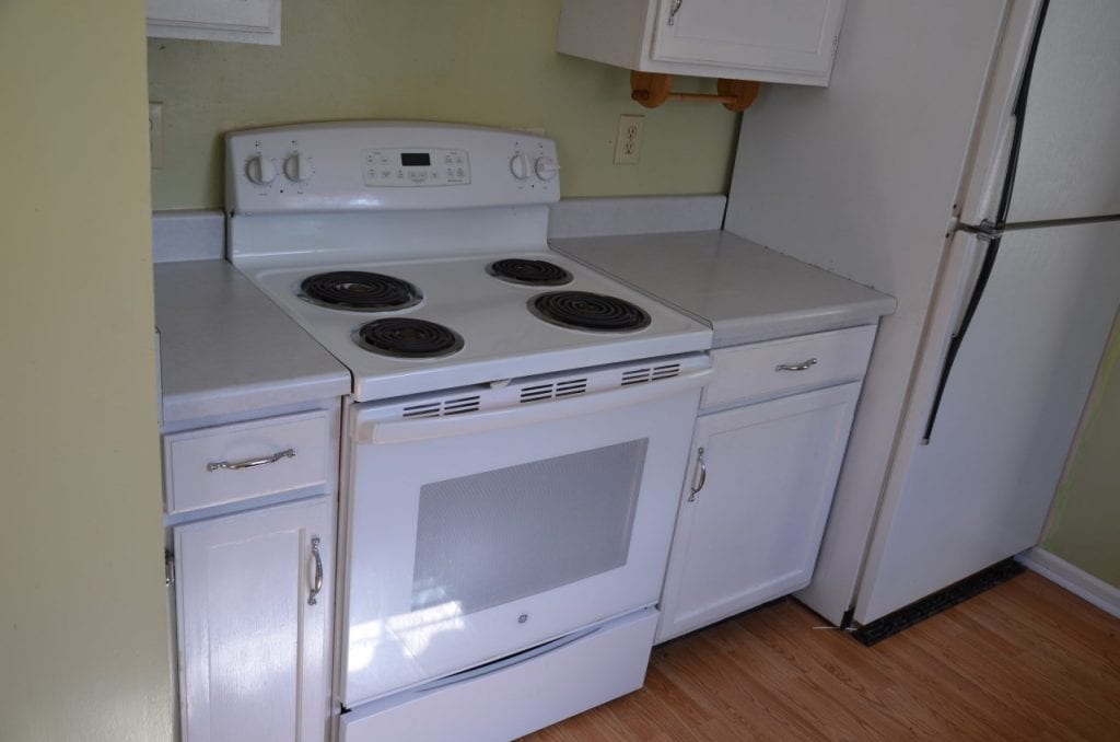 Before: a kitchen with an outdated stove