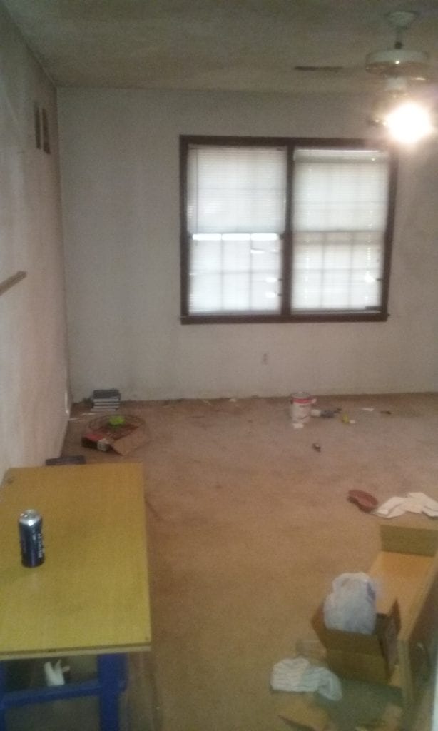 Before: An outdated interior with ancient and dirty carpet