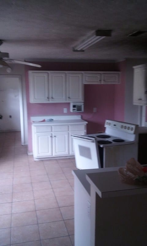 Before: a very outdated kitchen with outdated decor