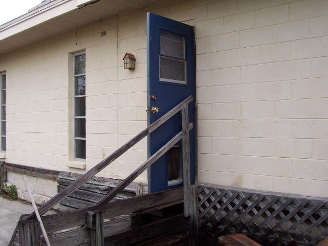 Before: a falling-apart and heavily weathered exterior staircase